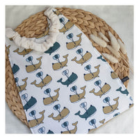 Serviette élastiquée "baleines"